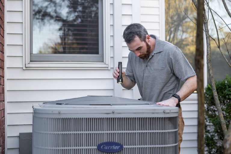 ac blowing warm air